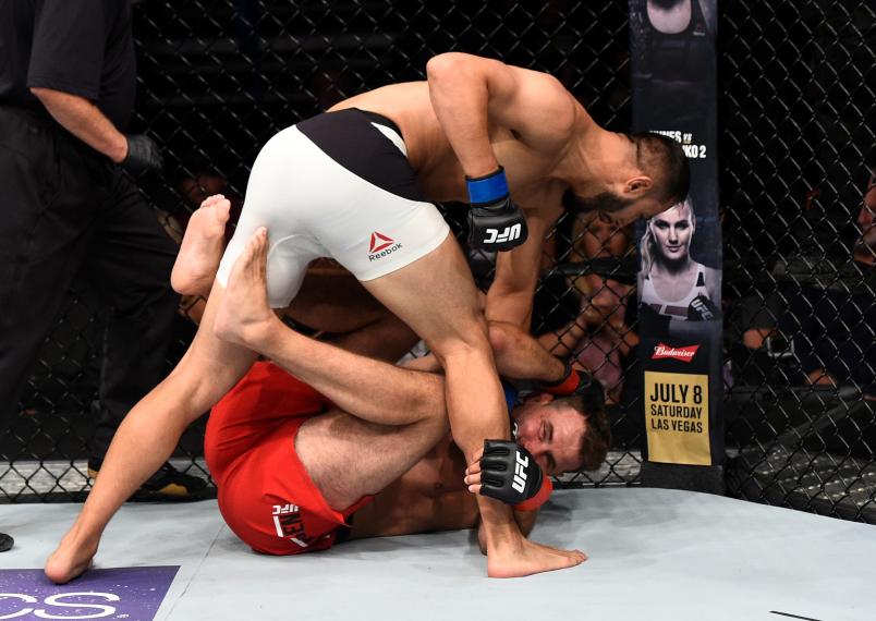OKLAHOMA CITY, OK - JUNE 25: (L-R) Dominick Reyes punches Joachim Christensen of Denmark in their light heavyweight bout during the UFC Fight Night event at the Chesapeake Energy Arena on June 25, 2017 in Oklahoma City. (Photo by Brandon Magnus/Zuffa LLC via Getty Images)