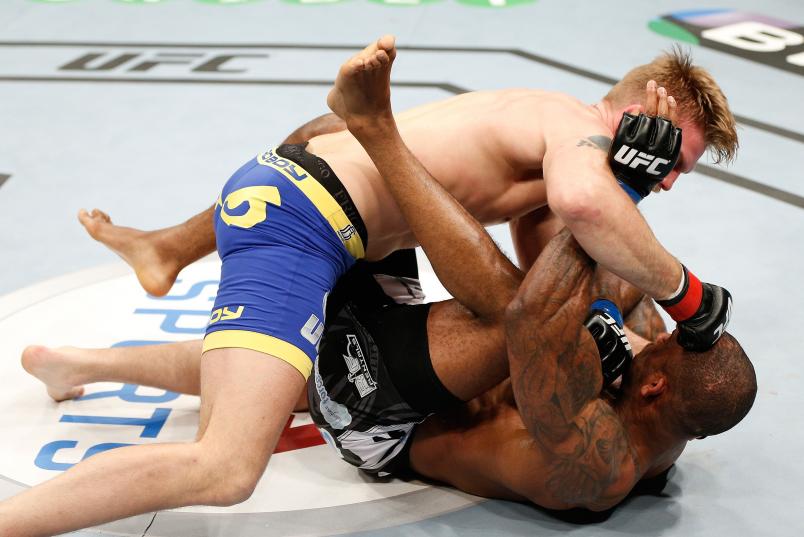 Alexander Gustafsson punches Jimi Manuwa in their light heavyweight fight during the UFC Fight Night London event at the O2 Arena on March 8, 2014 in London, England. (Photo by Josh Hedges/Zuffa LLC)