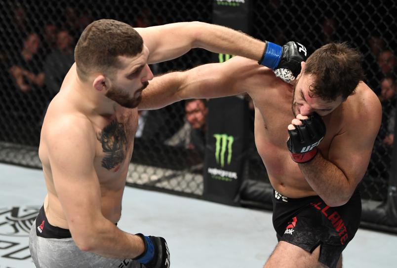 PRAGUE, CZECH REPUBLIC - FEBRUARY 23: (L-R) Michal Oleksiejczuk of Poland punches Gian Villante in their light heavyweight bout during the UFC Fight Night event at O2 Arena on February 23, 2019 in the Prague, Czech Republic. (Photo by Jeff Bottari/Zuffa LLC/Zuffa LLC via Getty Images)