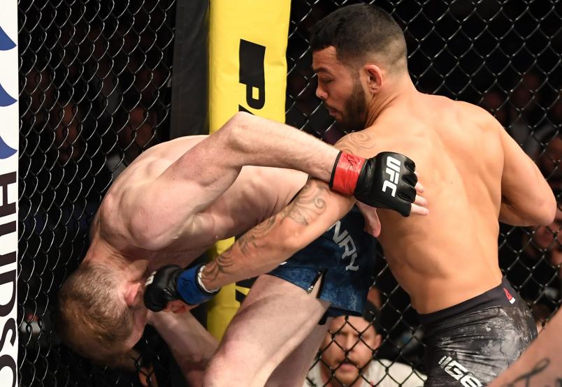 LONDON, ENGLAND - MARCH 16: (R-L) Dan Ige punches Danny Henry of Scotland in their featherweight bout during the UFC Fight Night event at The O2 Arena on March 16, 2019 in London, England. (Photo by Jeff Bottari/Zuffa LLC)