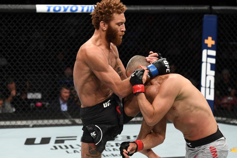 GREENVILLE, SC - JUNE 22: (L-R) Luis Pena knees Matt Wiman in their lightweight bout during the UFC Fight Night event at Bon Secours Wellness Arena on June 22, 2019 in Greenville, South Carolina. (Photo by Josh Hedges/Zuffa LLC/Zuffa LLC via Getty Images)