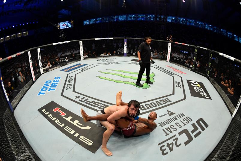 ABU DHABI, UNITED ARAB EMIRATES - SEPTEMBER 07: (R-L) Lerone Murphy of United Kingdom battles Zubaira Tukhugov of Russia in their featherweight bout during UFC 242 at The Arena on September 7, 2019 in Yas Island, Abu Dhabi, United Arab Emirates. (Photo by Jeff Bottari/Zuffa LLC)