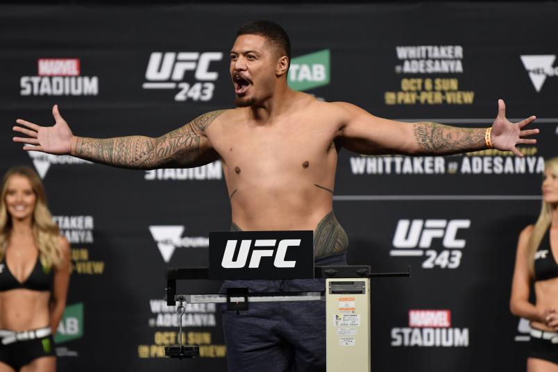 Justin Tafa of New Zealand poses on the scale during the UFC 243 weigh-in at Marvel Stadium on October 05, 2019 in Melbourne, Australia. (Photo by Jeff Bottari/Zuffa LLC via Getty Images)