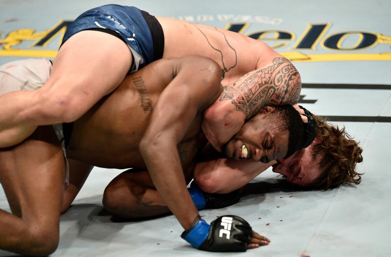 BOSTON, MASSACHUSETTS - OCTOBER 18: Brendan Allen secures a rear choke submission against Kevin Holland in their middleweight bout during the UFC Fight Night event at TD Garden on October 18, 2019 in Boston, Massachusetts. (Photo by Chris Unger/Zuffa LLC via Getty Images)