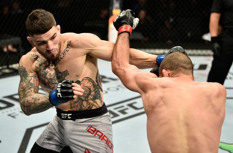 Sean Brady punches Court McGee in their welterweight bout during the UFC Fight Night event at TD Garden on October 18, 2019 in Boston, Massachusetts. (Photo by Chris Unger/Zuffa LLC)