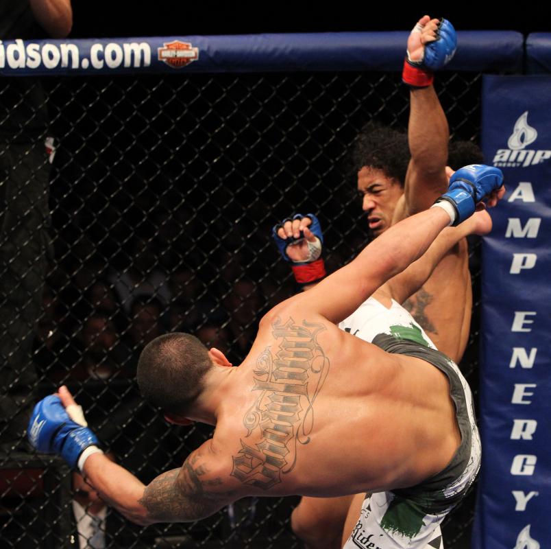 GLENDALE, AZ - DECEMBER 16: (L-R) Anthony Pettis kicks Ben Henderson at WEC 53 at the Jobing.com Arena on December 16, 2010 in Glendale, Arizona. (Photo by Josh Hedges/Zuffa LLC/Zuffa LLC via Getty Images)
