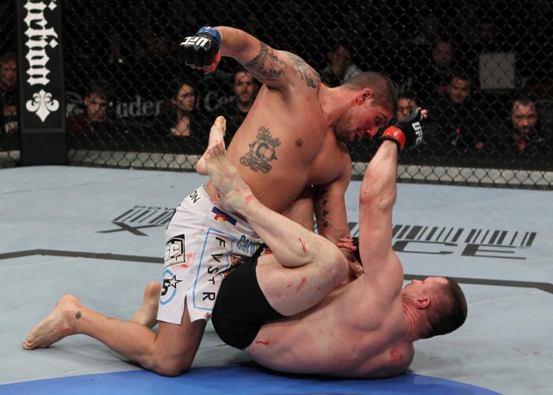 NEWARK, NJ - MARCH 19: (L-R) Brendan Schaub punches Mirko Crocop on the ground during their heavyweight bout at UFC 128 at the Prudential Center on March 19, 2011 in Newark, New Jersey. (Photo by Al Bello/Zuffa LLC/Zuffa LLC via Getty Images)