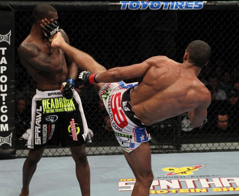 NEWARK, NJ - MARCH 19: (R-L) Edson Barboza kicks Anthony Njokuani during their lightweight bout at UFC 128 at the Prudential Center on March 19, 2011 in Newark, New Jersey. (Photo by Al Bello/Zuffa LLC/Zuffa LLC via Getty Images)