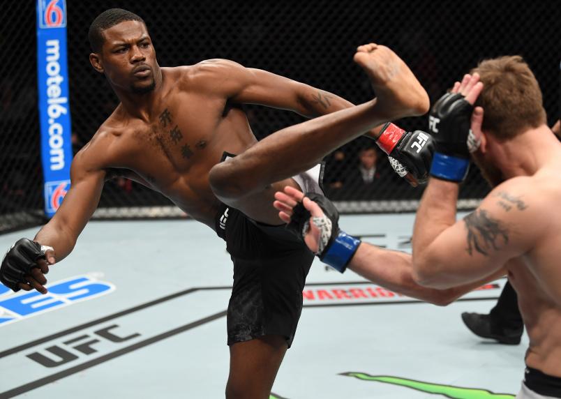 PHILADELPHIA, PA - MARCH 30: (L-R) Kevin Holland kicks Gerald Meerschaert in their middleweight bout during the UFC Fight Night event at Wells Fargo Center on March 30, 2019 in Philadelphia, Pennsylvania. (Photo by Josh Hedges/Zuffa LLC)