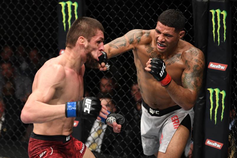 ATLANTA, GA - APRIL 13: (R-L) Max Griffin punches Zelim Imadaev of Russia in their welterweight bout during the UFC 236 event at State Farm Arena on April 13, 2019 in Atlanta, Georgia. (Photo by Josh Hedges/Zuffa LLC)