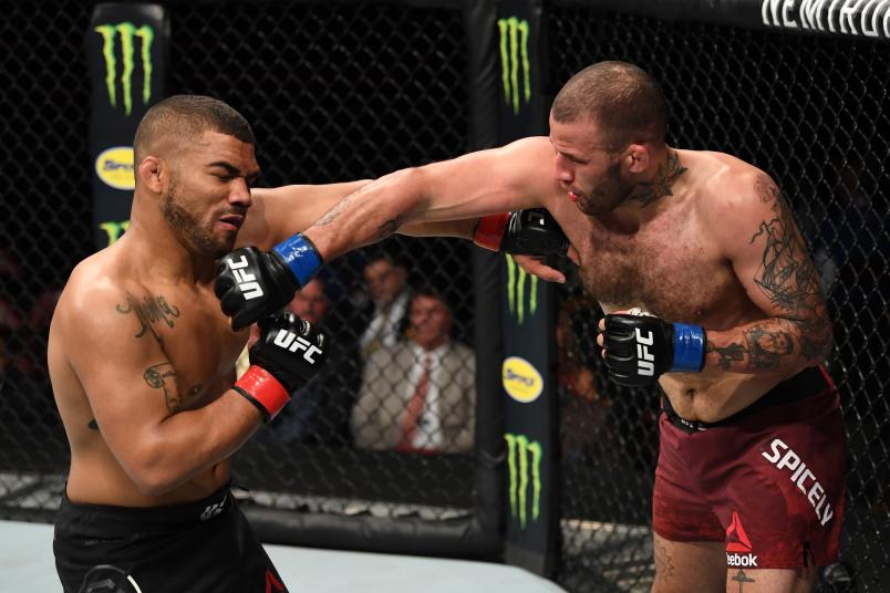 GREENVILLE, SC - JUNE 22: (R-L) Eric Spicely punches Deron Winn in their middleweight bout during the UFC Fight Night event at Bon Secours Wellness Arena on June 22, 2019 in Greenville, South Carolina. (Photo by Josh Hedges/Zuffa LLC/Zuffa LLC via Getty Images)