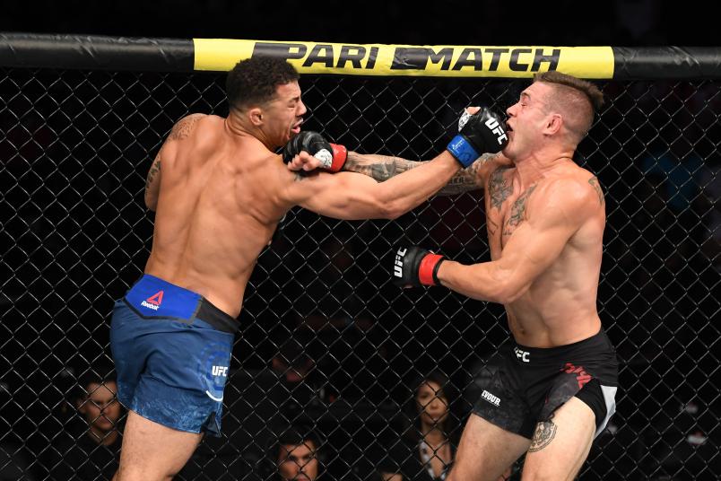 ANAHEIM, CALIFORNIA - AUGUST 17: (L-R) Drakkar Klose and Christos Giagos exchange punches in their lightweight bout during the UFC 241 event at the Honda Center on August 17, 2019 in Anaheim, California. (Photo by Josh Hedges/Zuffa LLC/Zuffa LLC via Getty Images)