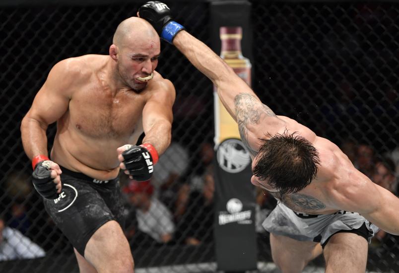 VANCOUVER, BRITISH COLUMBIA - SEPTEMBER 14: (L-R) Glover Teixeira of Brazil punches Nikita Krylov of Ukraine in their light heavyweight bout during the UFC Fight Night event at Rogers Arena on September 14, 2019 in Vancouver, Canada. (Photo by Jeff Bottari/Zuffa LLC/Zuffa LLC)