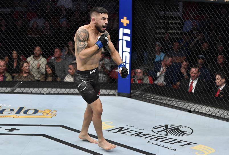RALEIGH, NORTH CAROLINA - JANUARY 25: Alex Perez celebrates after his submission victory over Jordan Espinosa in their flyweight fight during the UFC Fight Night event at PNC Arena on January 25, 2020 in Raleigh, North Carolina. (Photo by Jeff Bottari/Zuffa LLC via Getty Images)
