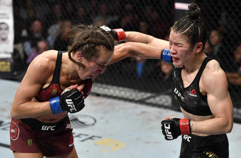 Joanna Jedrzejczyk of Poland punches Zhang Weili of China in their UFC strawweight championship fight during the UFC 248 event at T-Mobile Arena on March 07, 2020 in Las Vegas, Nevada. (Photo by Jeff Bottari/Zuffa LLC)