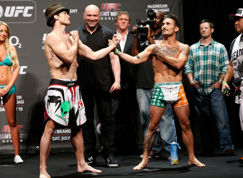 DUBLIN, IRELAND - JULY 18: (L-R) Opponents Brad Pickett and Ian McCall face off during the UFC weigh-in event at The O2 on July 18, 2014 in Dublin, Ireland. (Photo by Josh Hedges/Zuffa LLC/Zuffa LLC via Getty Images)