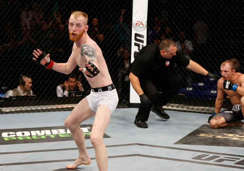 DUBLIN, IRELAND - JULY 19: Patrick Holohan celebrates after his submission victory over Josh Sampo in their flyweight bout during the UFC Fight Night event at The O2 Dublin on July 19, 2014 in Dublin, Ireland. (Photo by Josh Hedges/Zuffa LLC/Zuffa LLC via Getty Images)