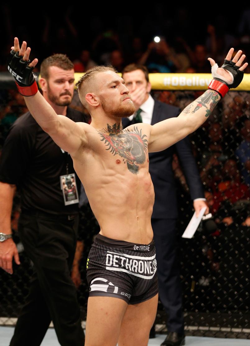 DUBLIN, IRELAND - JULY 19: Conor McGregor enters the Octagon before his featherweight bout against Diego Brandao during the UFC Fight Night event at The O2 Dublin on July 19, 2014 in Dublin, Ireland. (Photo by Josh Hedges/Zuffa LLC/Zuffa LLC via Getty Images)