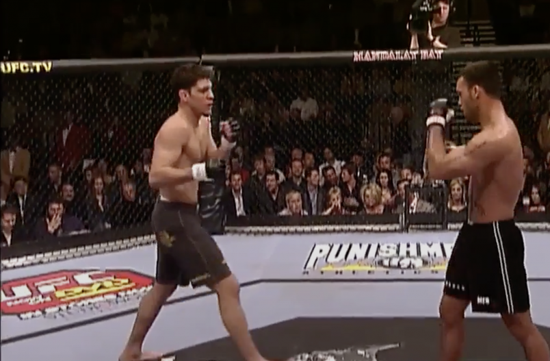 Nick Diaz approaches Robbie Lawler in their UFC 47 bout.