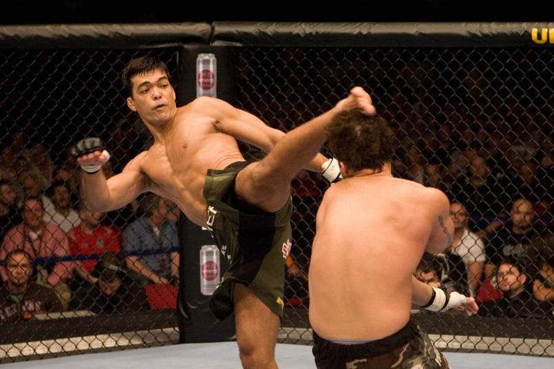 MANCHESTER, ENGLAND - APRIL 21: Lyoto Machida (green shorts) def. David Heath (black/camo shorts) - Unanimous Decision during UFC 70 at M.E.N. Arena on April 21, 2007 in Manchester, England. (Photo by Josh Hedges/Zuffa LLC via Getty Images)