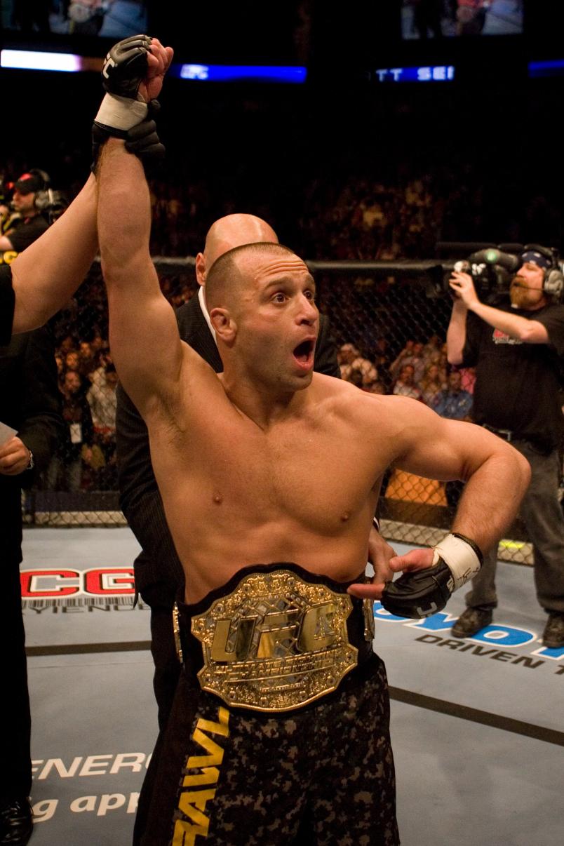 HOUSTON - APRIL 7: Matt Serra (brown/camo shorts) def. Georges St-Pierre (green shorts) - TKO - 3:25 round 1 during UFC 69 at Toyota Center on April 7, 2007 in Houston, Texas. (Photo by Josh Hedges/Zuffa LLC via Getty Images)