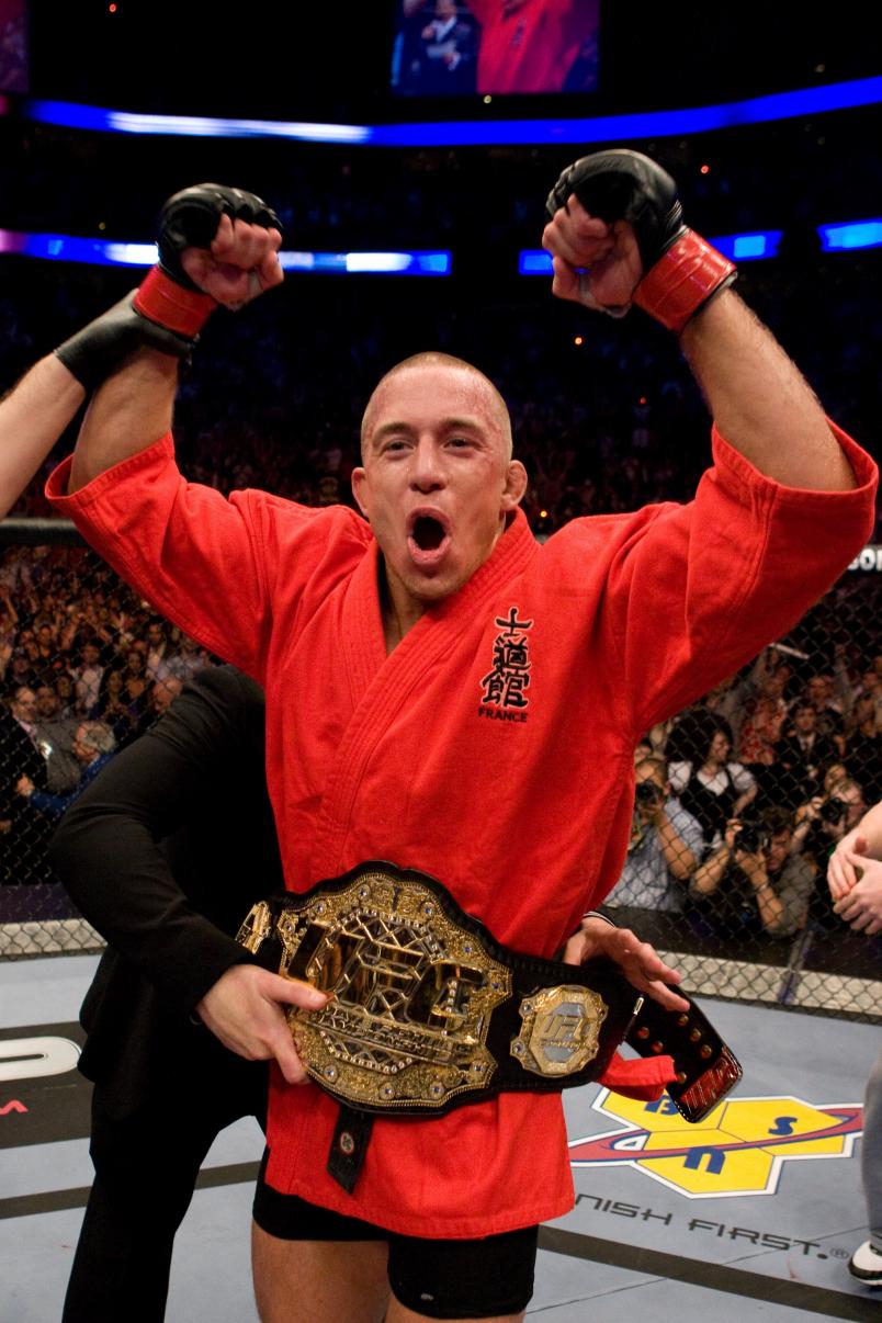 MONTREAL - APRIL 19: Georges St-Pierre (black tight shorts) def. Matt Serra (black/camo sprawl shorts) - TKO - 4:45 round 2 during the UFC 83 at Bell Centre on April,19,2008 in Montreal, Canada. (Photo by: Josh Hedges/Zuffa LLC via Getty Images)
