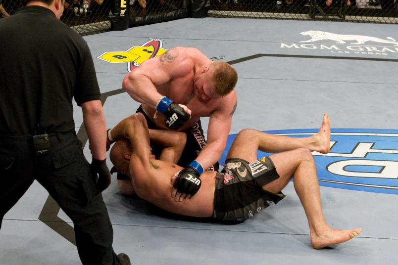LAS VEGAS - NOVEMBER 15: Brock Lesnar (black shorts) def. Randy Couture (grey/black shorts) - TKO - 3:07 round 2 during the UFC 91 at MGM Grand Garden Arena on November 15, 2008 in Las Vegas, Nevada. (Photo by: Josh Hedges/Zuffa LLC via Getty Images)