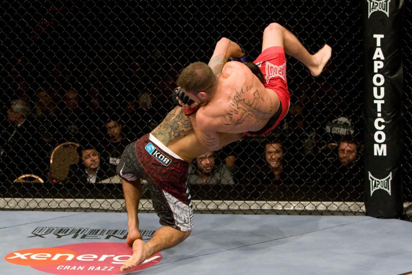 LAS VEGAS - NOVEMBER 15: Jeremy Stephens (red shorts) def. Rafael dos Anjos (black/white/red shorts) - KO - :39 round 3 during the UFC 91 at MGM Grand Garden Arena on November 15, 2008 in Las Vegas, Nevada. (Photo by: Josh Hedges/Zuffa LLC via Getty Images)