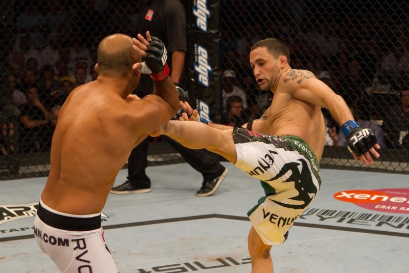 ABU DHABI, UNITED ARAB EMIRATES - APRIL 10: Frankie Edgar (white/green shorts) def. BJ Penn (white shorts) - Unanimous decision during UFC 112 at Yas Island on April 10, 2010 in Abu Dhabi, United Arab Emirates. (Photo by Josh Hedges/Zuffa LLC via Getty Images)