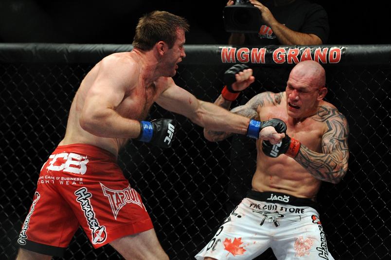 Stephan Bonnar throws a left to the body of Krzysztof Soszynski during the UFC light heavyweight bout at the MGM Grand Garden Arena on July 3, 2010 in Las Vegas, Nevada. (Photo by Jon Kopaloff/Zuffa LLC/Zuffa LLC via Getty Images)