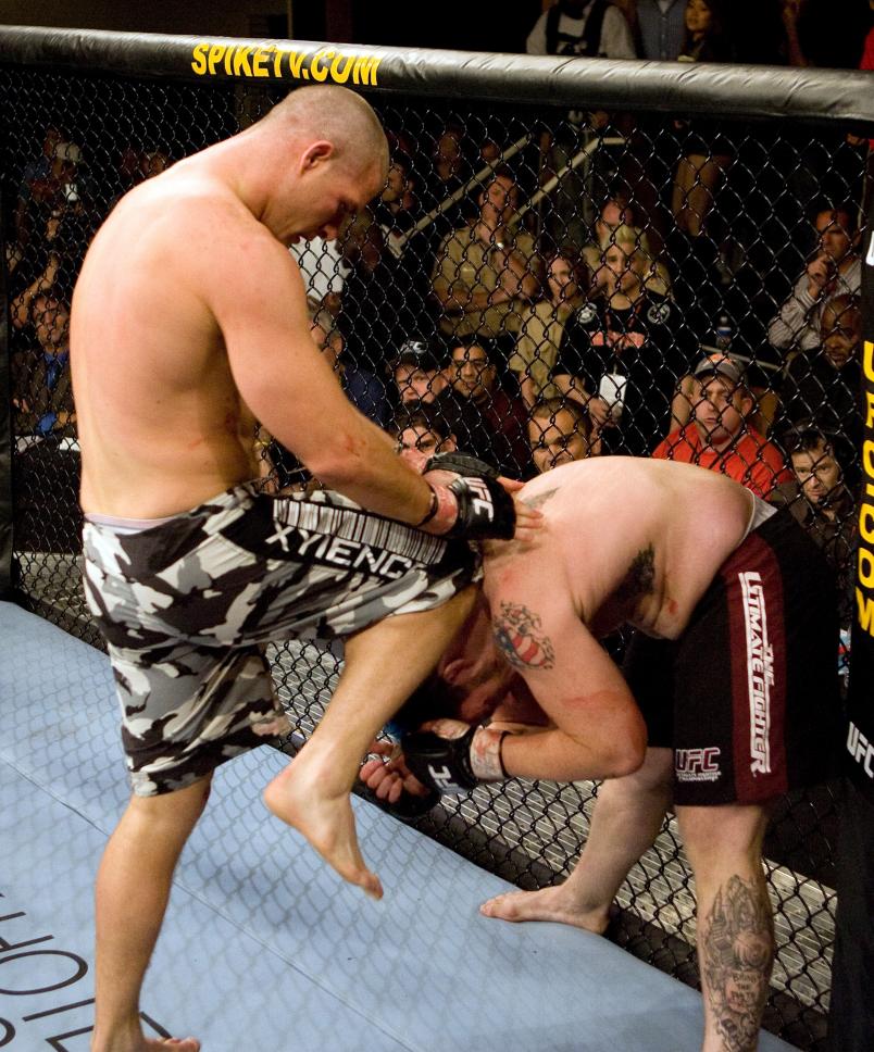 LAS VEGAS - JUNE 24: Michael Bisping (L) knees Josh Haynes at The Ultimate Fighter 3 Finale at the Joint at the Hard Rock on June 24, 2006 in Las Vegas, Nevada. (Photo by Josh Hedges/Zuffa LLC/Zuffa LLC via Getty Images)