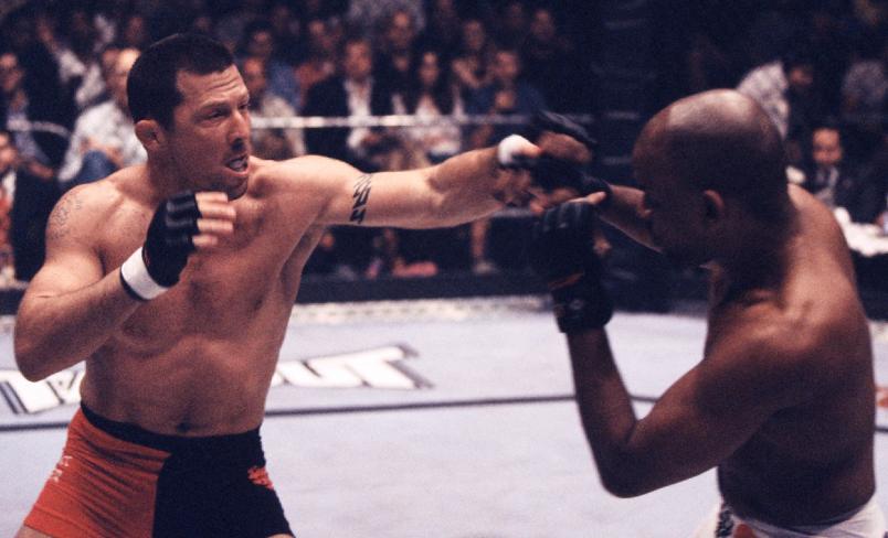 EAST RUTHERFORD, NJ - JUNE 29: (L-R) Pat Miletich punches Shonie Carter during their bout at UFC 32 on June 29, 2001 in East Rutherford, New Jersey. (Photo by Zuffa LLC/Zuffa LLC via Getty Images)