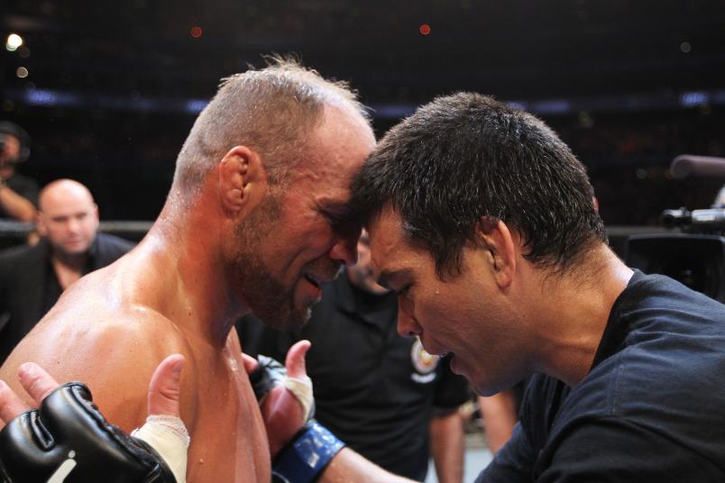 TORONTO, ON - APRIL 30: Lyoto Machida (R) embraces Randy Couture (L) after defeating him by knockout in the second round of their Light Heavyweight bout at UFC 129 in the Rogers Centre on April 30, 2011 in Toronto, Ontario. (Photo by Al Bello/Zuffa LLC/Zuffa LLC via Getty Images)