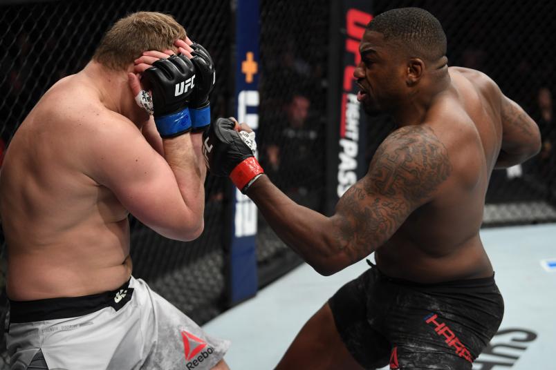 OTTAWA, ON - MAY 04: (R-L) Walt Harris punches Serghei Spivac of Moldova in their heavyweight bout during the UFC Fight Night event at Canadian Tire Centre on May 4, 2019 in Ottawa, Ontario, Canada. (Photo by Jeff Bottari/Zuffa LLC/Zuffa LLC via Getty Images)