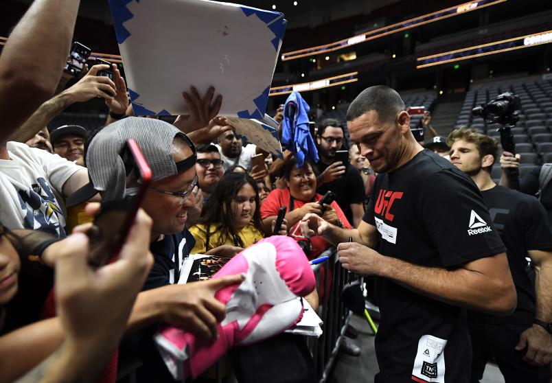ANAHEIM, CA - AUGUST 14: Former UFC lightweight title challenger Nate Diaz gives autographs after holding an open workout for fans and media at Honda Center on August 14, 2019 in Anaheim, California. (Photo by Kevork Djansezian/Zuffa LLC)
