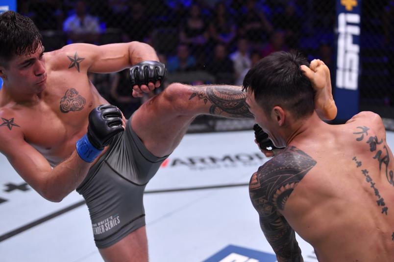 LAS VEGAS, NEVADA - AUGUST 27: (L-R) Peter Barrett kicks Sanghoon Yoo in their lightweight bout during Dana White's Contender Series season three week 10 at the UFC Apex on August 27, 2019 in Las Vegas, Nevada. (Photo by Jeff Bottari/DWCS LLC/Zuffa LLC)