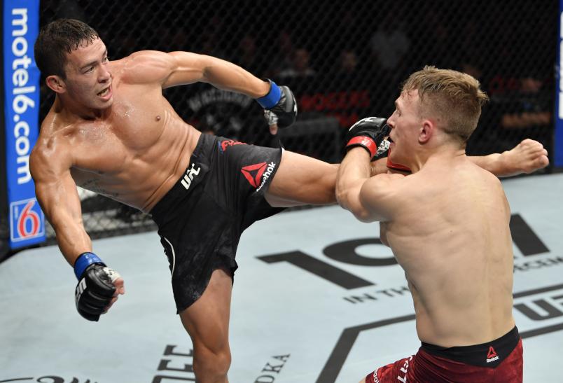 VANCOUVER, BRITISH COLUMBIA - SEPTEMBER 14: (L-R) Hunter Azure kicks Brad Katona of Canada in their bantamweight bout during the UFC Fight Night event at Rogers Arena on September 14, 2019 in Vancouver, Canada. (Photo by Jeff Bottari/Zuffa LLC)