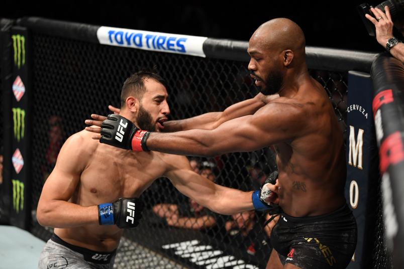 Dominick Reyes punches Jon Jones in their light heavyweight championship bout during the UFC 247 event at Toyota Center on February 08, 2020 in Houston, Texas. (Photo by Josh Hedges/Zuffa LLC via Getty Images)