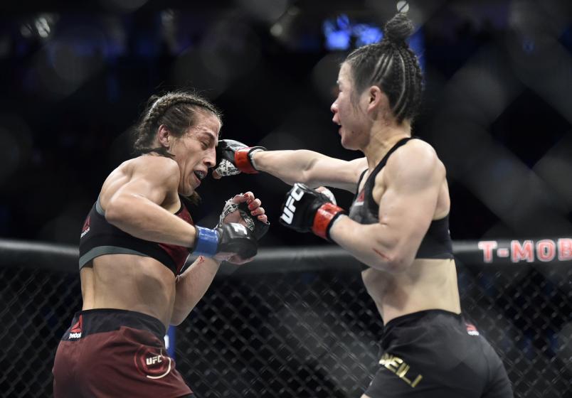 Zhang Weili of China punches Joanna Jedrzejczyk of Poland in their UFC strawweight championship fight during the UFC 248 event at T-Mobile Arena on March 07, 2020 in Las Vegas, Nevada. (Photo by Chris Unger/Zuffa LLC)