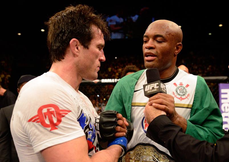 LAS VEGAS, NV - JULY 7: (R-L) Anderson Silva speaks with Chael Sonnen after he defeated him during their UFC middleweight championship bout at UFC 148 inside MGM Grand Garden Arena on July 7, 2012 in Las Vegas, Nevada. (Photo by Donald Miralle/Zuffa LLC/Zuffa LLC via Getty Images)