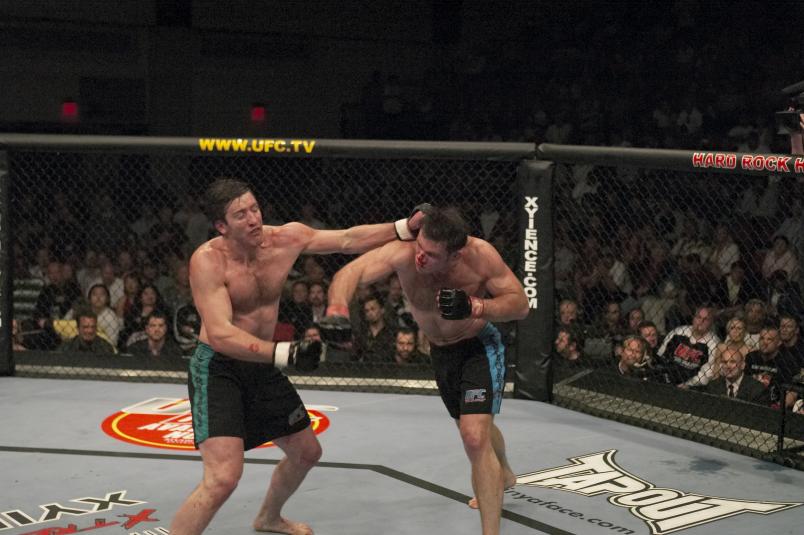 LAS VEGAS, NV - APRIL 09: (R-L) Forrest Griffin punches Stephan Bonnar during their light heavyweight finals bout at The Ultimate Fighter Season 1 Finale inside the Cox Pavilion on April 9, 2005 in Las Vegas, Nevada. (Photo by Josh Hedges/Zuffa LLC/Zuffa LLC via Getty Images)