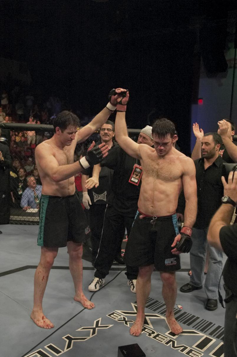 LAS VEGAS, NV - APRIL 09: (R-L) Forrest Griffin reacts after his decision victory over Stephan Bonnar in the light heavyweight finals bout at The Ultimate Fighter Season 1 Finale inside the Cox Pavilion on April 9, 2005 in Las Vegas, Nevada. (Photo by Josh Hedges/Zuffa LLC/Zuffa LLC via Getty Images)