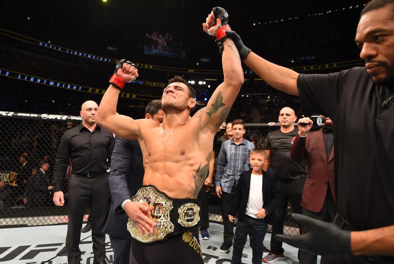 Rafael dos Anjos celebrates his TKO victory over Donald Cerrone in their UFC lightweight title bout during the UFC Fight Night event at the Amway Center on December 19, 2015 in Orlando, Florida. (Photo by Josh Hedges/Zuffa LLC via Getty Images)