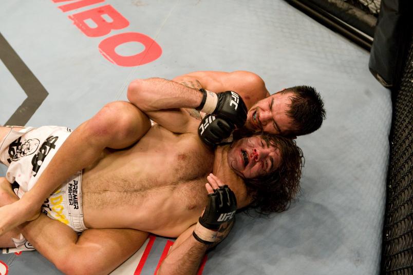 LAS VEGAS - DECEMBER 8: Roger Huerta (red/white/green shorts) def. Clay Guida (long hair) - Submission (rear naked choke) - :31 round 3 during The Ultimate Fighter 6 Finale on December 8, 2007 in Las Vegas, Nevada. (Photo by: Josh Hedges/Zuffa LLC via Getty Images)