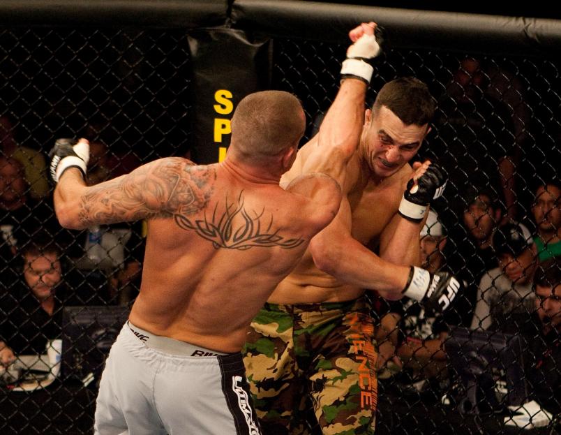 Scott Smith and Pete Sell exchange punches at The Ultimate Fighter 4 Finale at the Joint at the Hard Rock on November 11, 2006 in Las Vegas, Nevada. (Photo by Josh Hedges/Zuffa LLC via Getty Images)