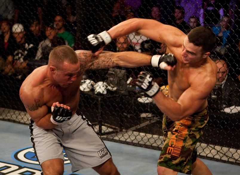 Scott Smith and Pete Sell exchange punches at The Ultimate Fighter 4 Finale at the Joint at the Hard Rock on November 11, 2006 in Las Vegas, Nevada. (Photo by Josh Hedges/Zuffa LLC via Getty Images)
