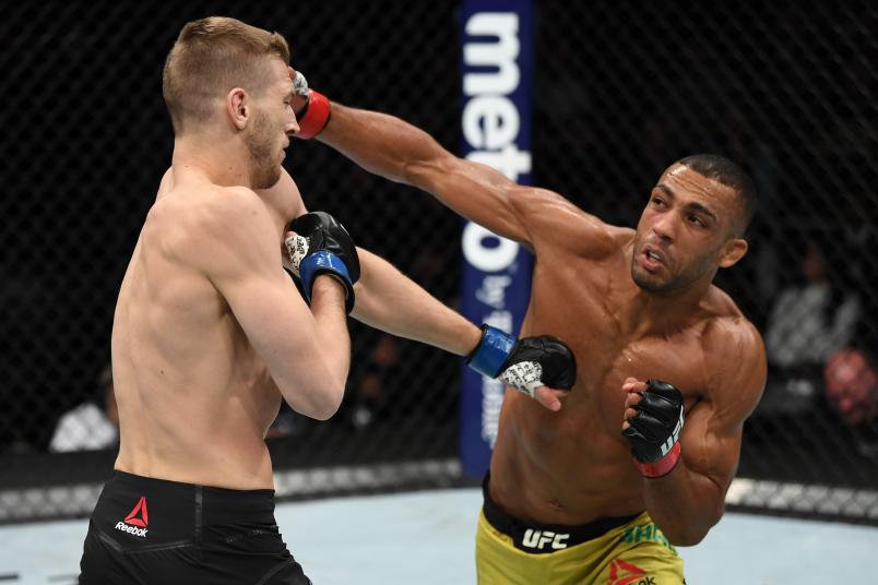 MILWAUKEE, WISCONSIN - DECEMBER 15: (R-L) Edson Barboza of Brazil punches Dan Hooker of New Zealand in their lightweight bout during the UFC Fight Night event at Fiserv Forum on December 15, 2018 in Milwaukee, Wisconsin. (Photo by Jeff Bottari/Zuffa LLC/Zuffa LLC via Getty Images)