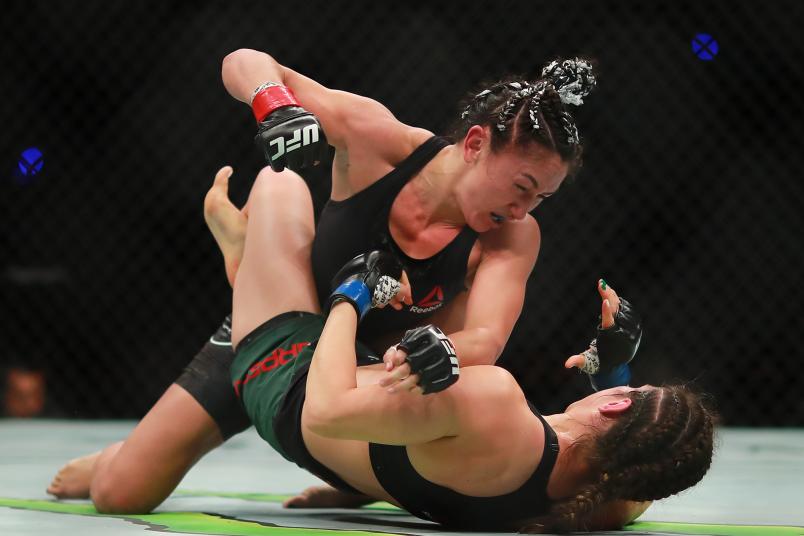 MEXICO CITY, MEXICO - SEPTEMBER 21: Carla Esparza of Mexico punches Alexa Grasso in their women's strawweight bout during UFC Fight Night event at Arena Ciudad de Mexico on September 21, 2019 in Mexico City, Mexico. (Photo by Hector Vivas/Zuffa LLC/Zuffa LLC)