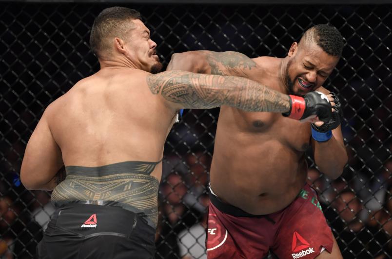 MELBOURNE, AUSTRALIA - OCTOBER 06: (R-L) Yorgan De Castro of Cape Verde knocks out Justin Tafa of Australia in their heavyweight fight during the UFC 243 event at Marvel Stadium on October 06, 2019 in Melbourne, Australia. (Photo by Jeff Bottari/Zuffa LLC/Zuffa LLC via Getty Images)