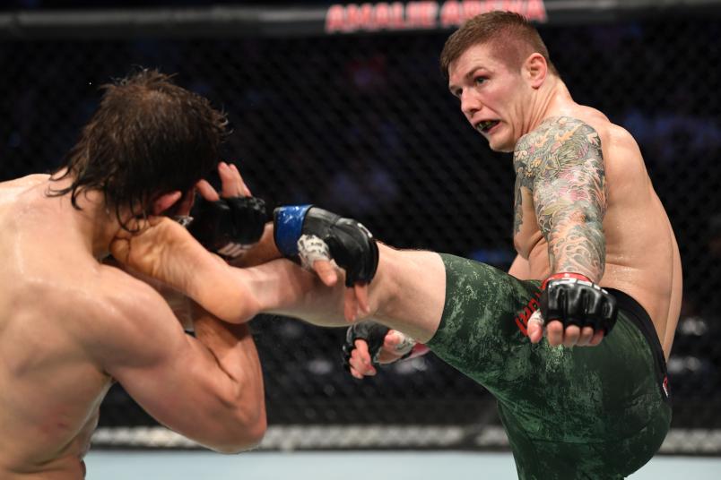 TAMPA, FLORIDA - OCTOBER 12: (R-L) Marvin Vettori of Italy kicks Andrew Sanchez in their middleweight bout during the UFC Fight Night event at Amalie Arena on October 12, 2019 in Tampa, Florida. (Photo by Josh Hedges/Zuffa LLC via Getty Images)